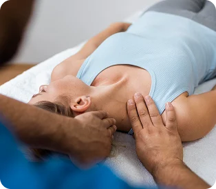 Patient receiving therapeutic neck treatment