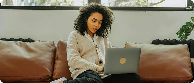 Woman reviewing her personalized primary care plan online