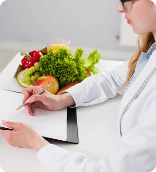 Nutrition specialist creating a personalized wellness plan