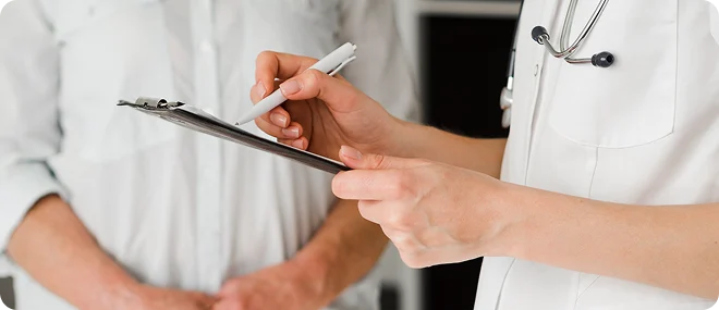 Primary care provider reviewing information with a patient