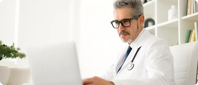 Doctor reviewing and updating a patient’s wellness plan
